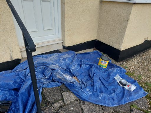 Painting of render band course damp course